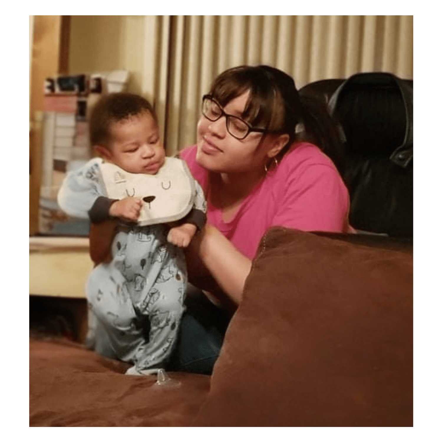 Mother holding baby boy